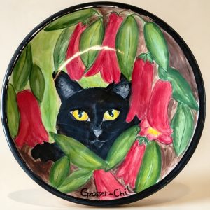 Plato deco de colección: Mirada entre Copihues